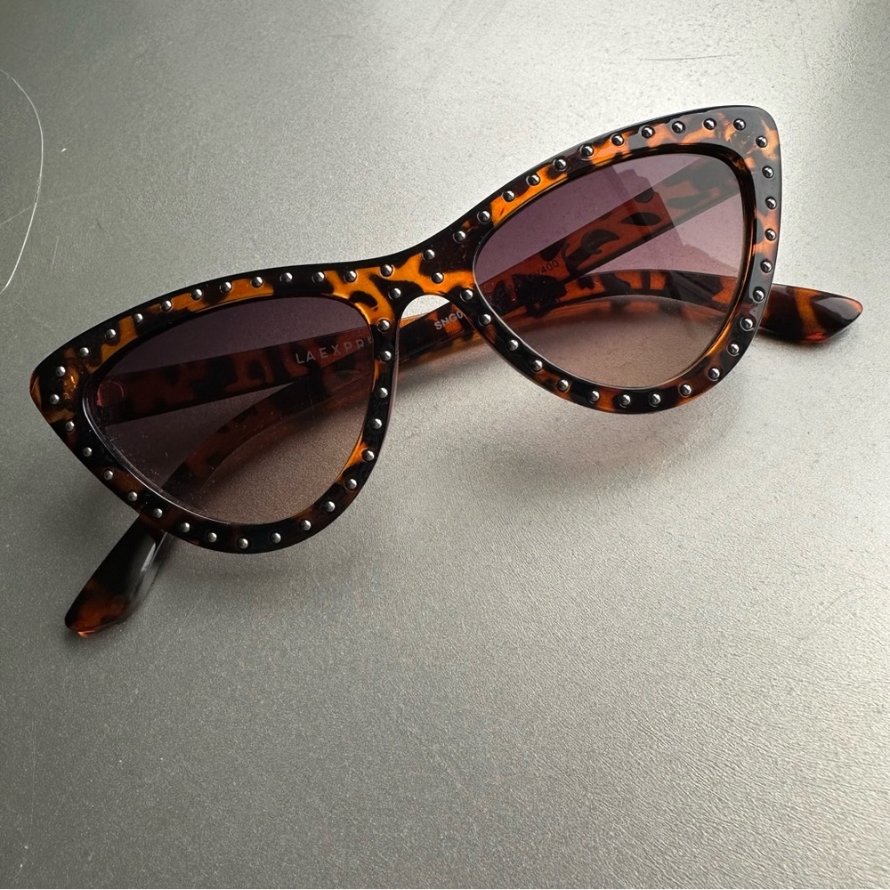 Studded cat eye sunglasses